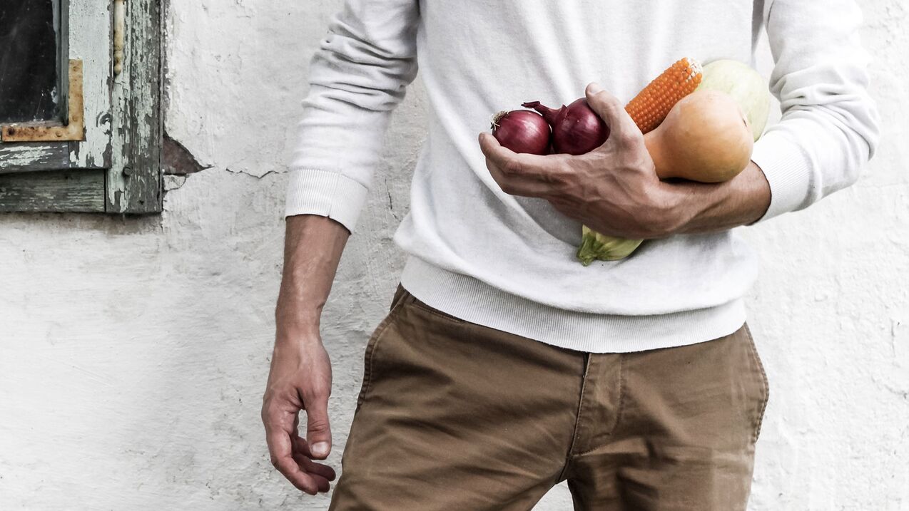 man with healthy food to increase strength